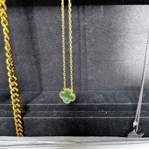 New gold color chain with green clover